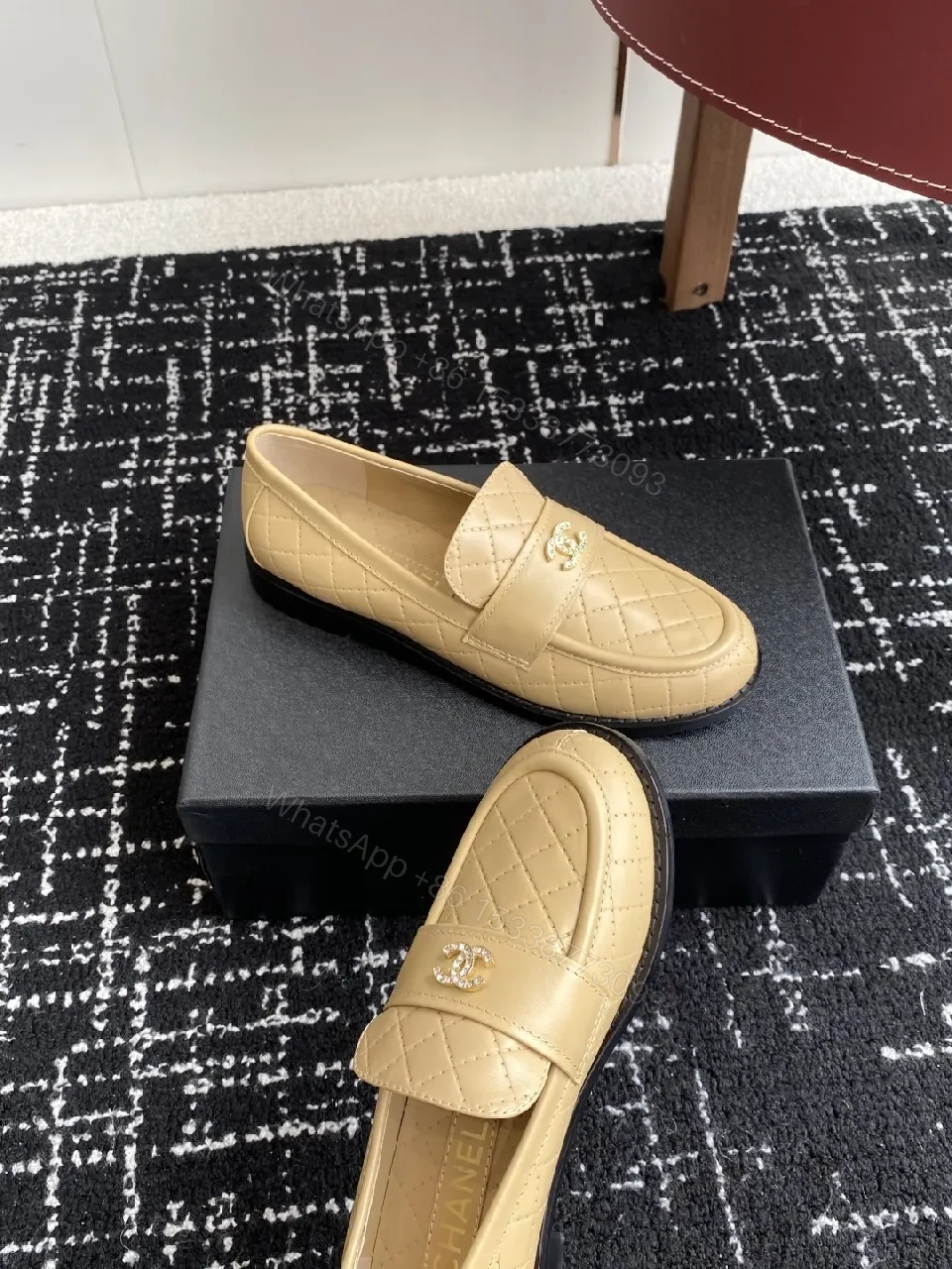 View 2 of Cream Quilted Leather Loafers with Gold Emblem – Everyday Luxury