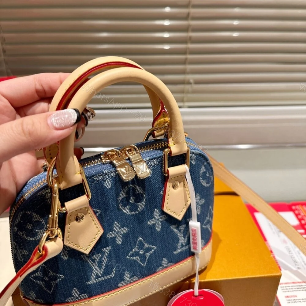 View 4 of Louis Vuitton Alma BB Monogram Canvas Bag Denim Blue 16Cm