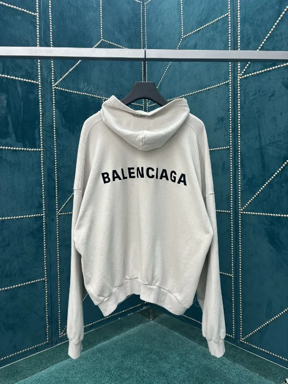 View 11 of Neutral Cotton Blend Minimalist Hoodie with Subtle Logo (Unisex)