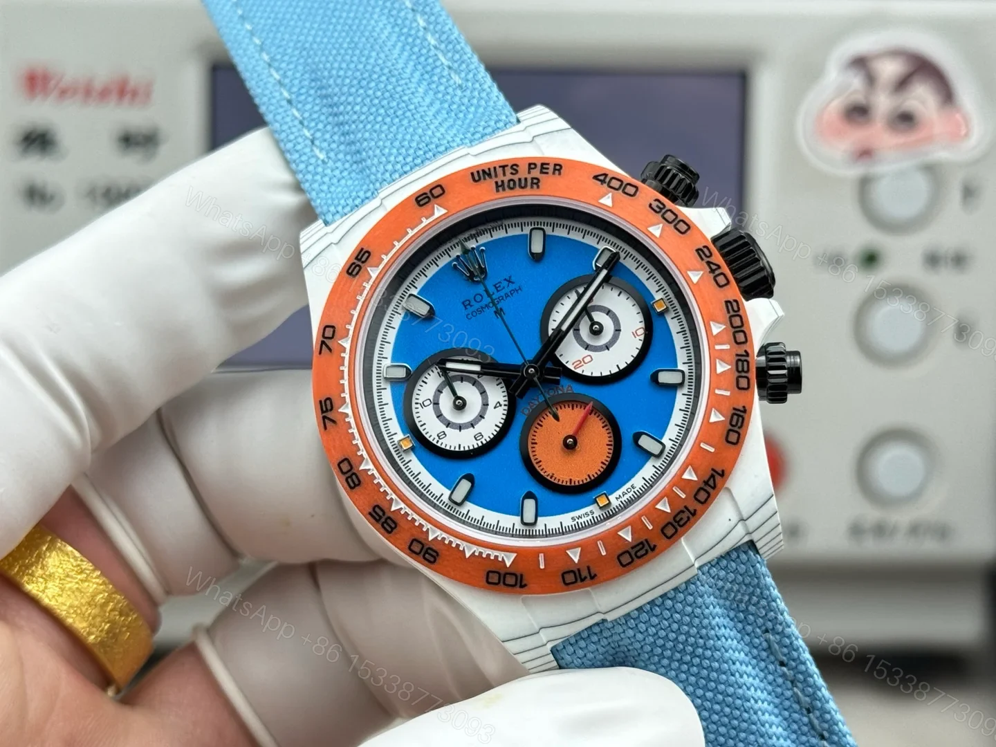 View 2 of Rolex Daytona Carbon Fiber Replica 40MM Exclusive Blue Dial Orange Bezel Fabric Strap R74 RG-ROLEX-DAYTONA