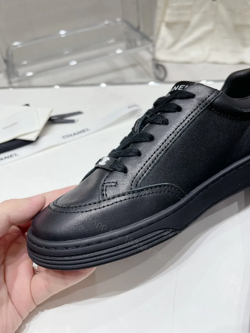 View 2 of Black Leather Sneakers: Subtle Branding, All-Day Comfort