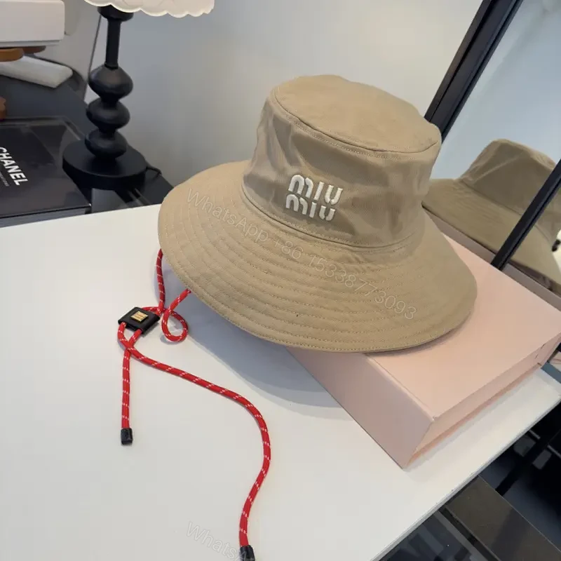 Textured Beige Canvas Bucket Hat with Logo Detail — view 1