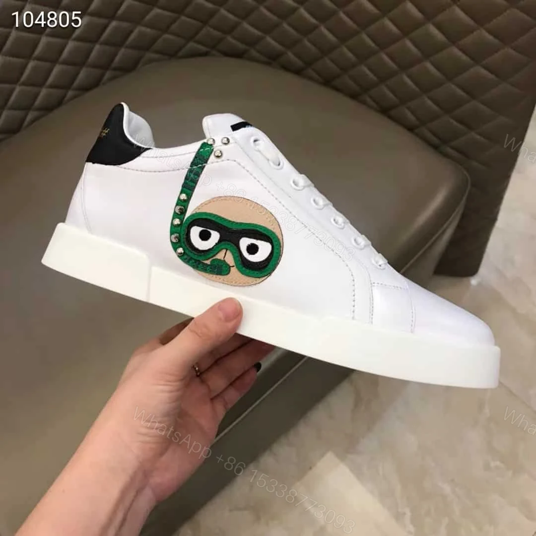 View 2 of DOLCE & GABBANA CALFSKIN PORTOFINO SNEAKERS WITH PATCHES OF THE DESIGNERS – DG2