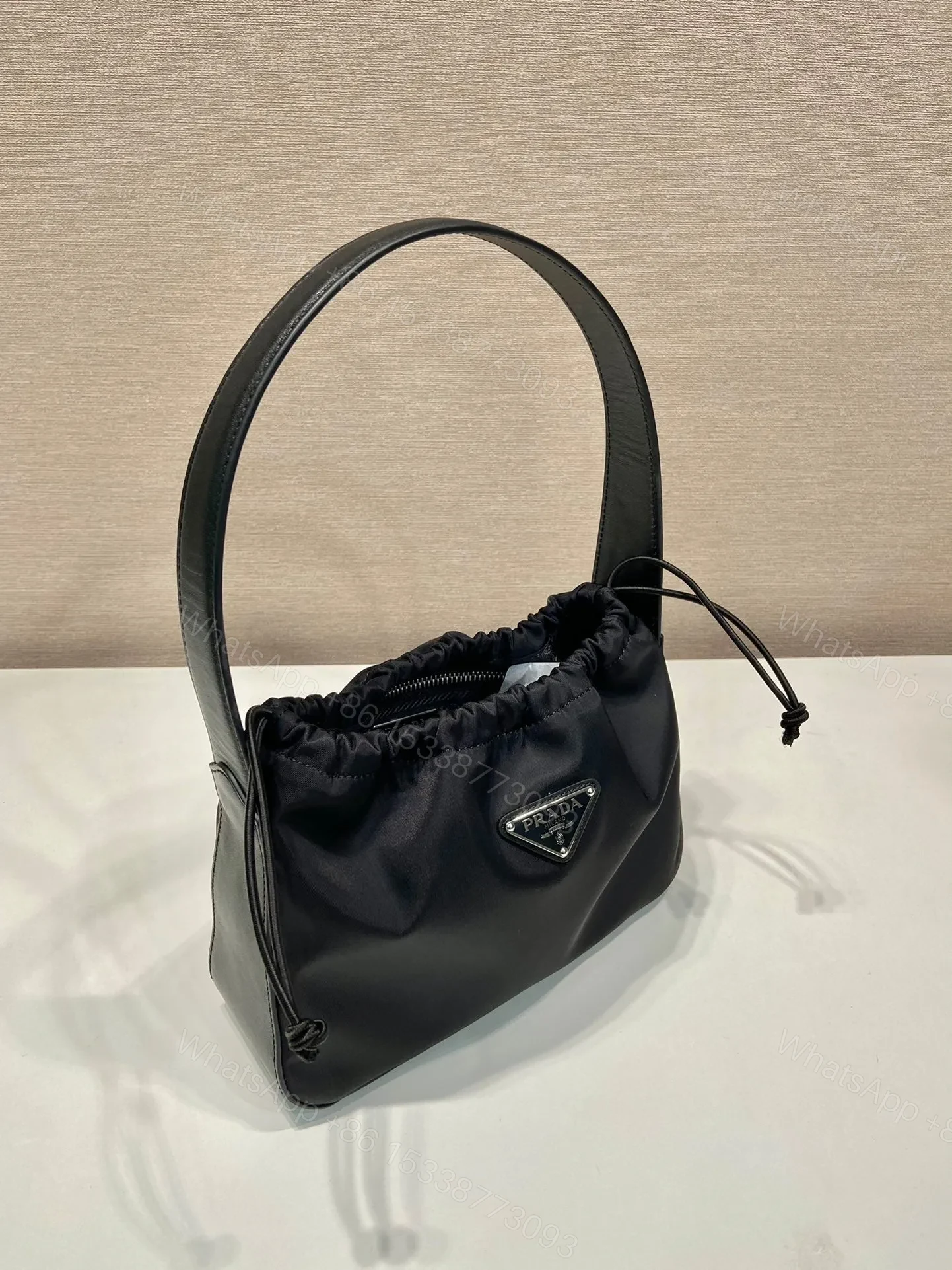 View 2 of SMALL DRAWSTRING BAG 23 IN BLACK RE-NYLON