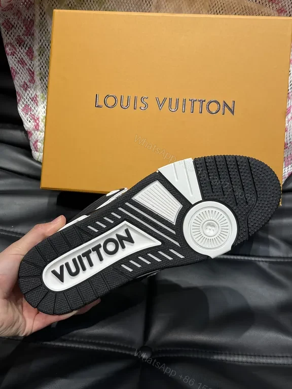 View 7 of White Leather High-Top Sneakers with LV Branding and Visible Hardware
