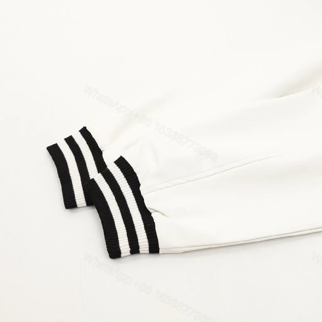 View 2 of Black & Ivory Varsity Jacket - Knit Outerwear, Contrast Sleeve, Signature Trim