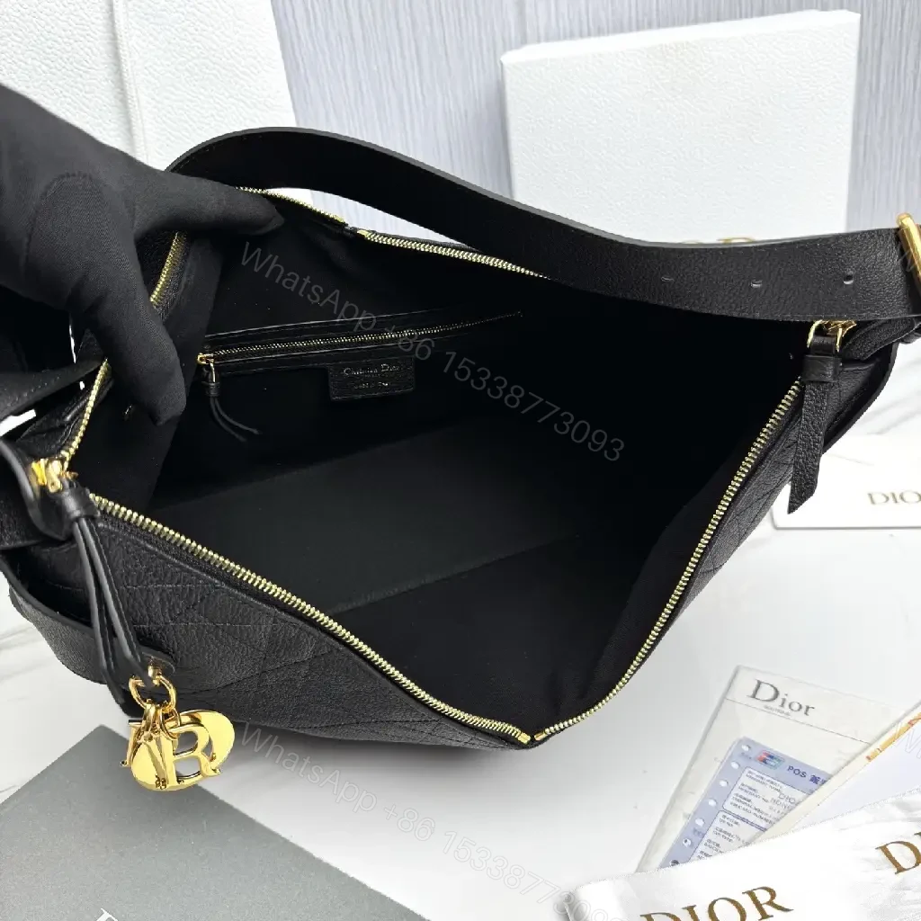View 10 of Chic Black Leather Hobo with Gold Accents — Luxury Everyday Bag