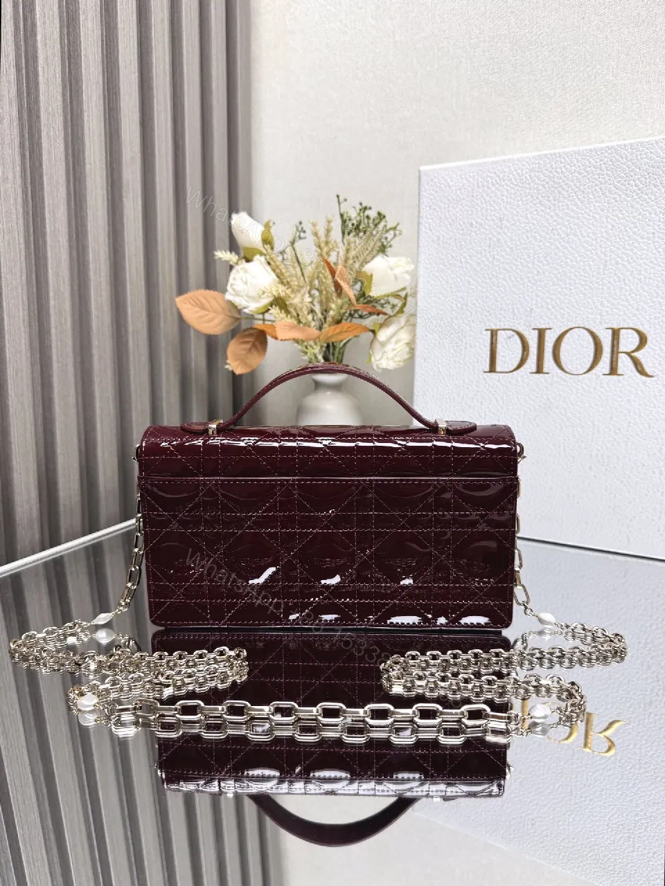 View 3 of Burgundy Patent Leather Clutch: Geometric Quilted Luxury