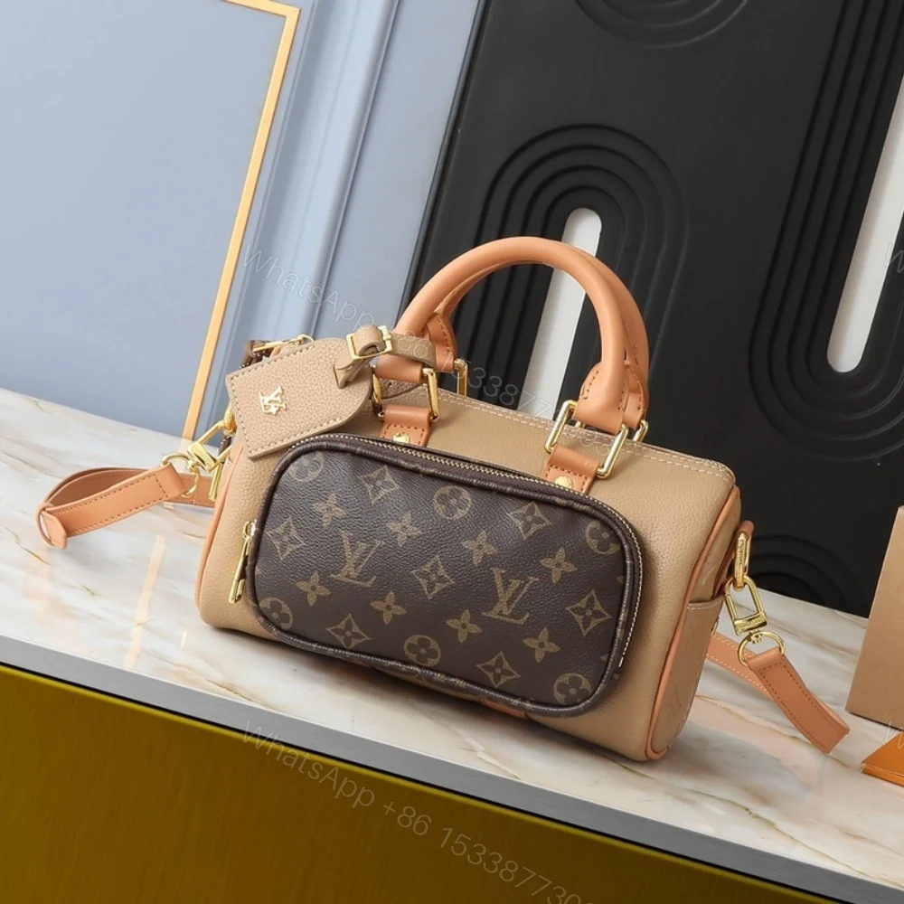 View 2 of Louis Vuitton Keepall Bandoulière 25 Bag Beige 25Cm M12627