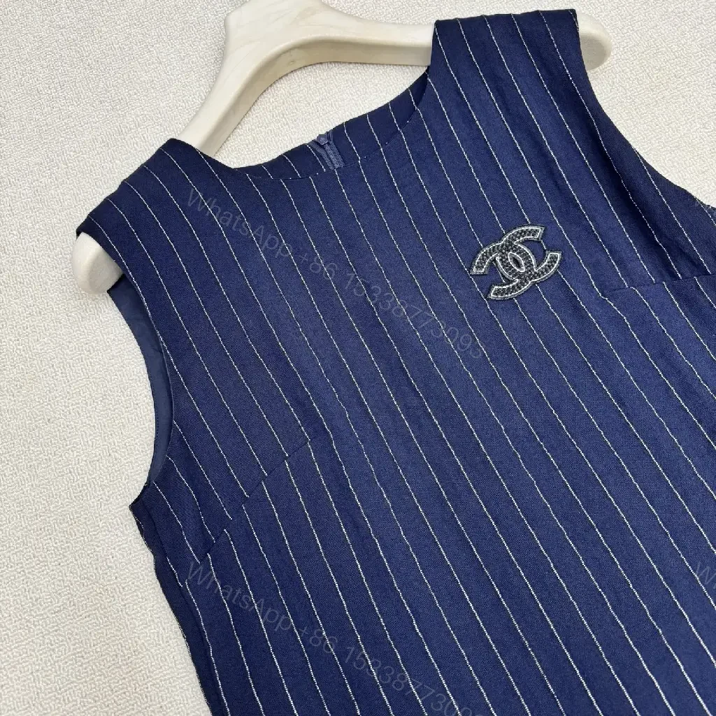 View 7 of Navy Pinstripe Cotton A-Line Dress with Chanel Logo Key Feature