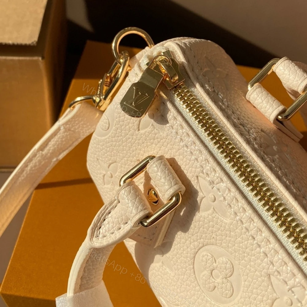 View 4 of Louis Vuitton Speedy Bandoulière Bag 20 Cream 20Cm M58954