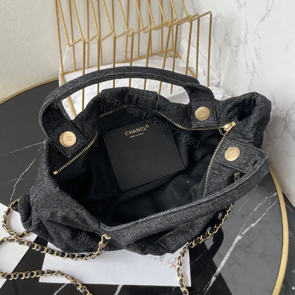 View 2 of Chic Denim Quilt Bag with Gold Hardware
