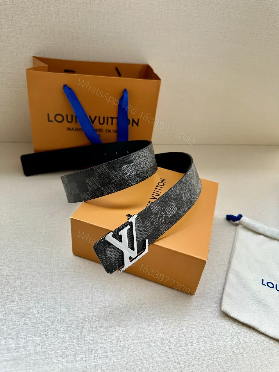 View 7 of Checkerboard Canvas Belt with Signature Buckle – Premium Modern Accessory