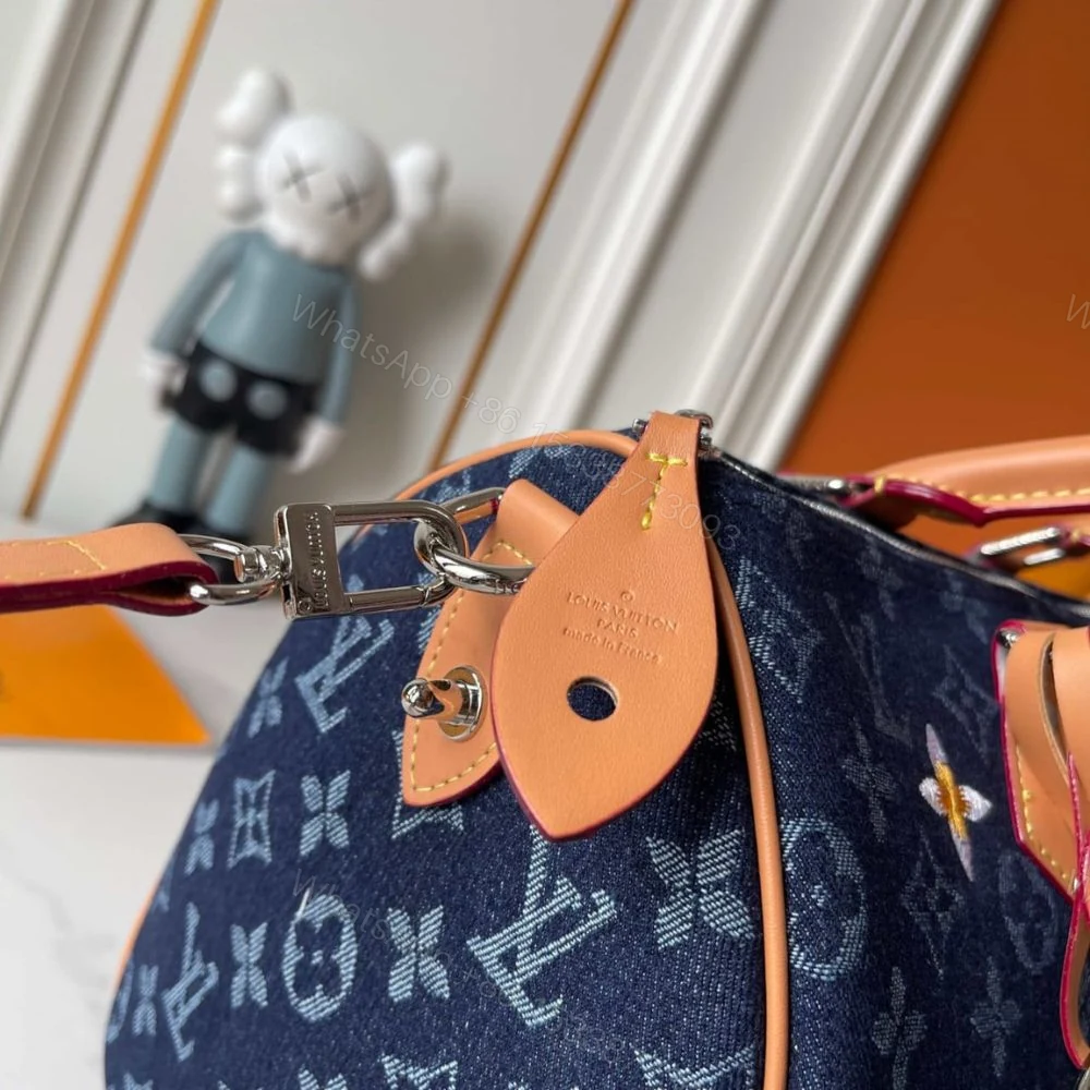 View 10 of Louis Vuitton Speedy 30 Bandoulière Bag Blue Denim 30Cm M27556