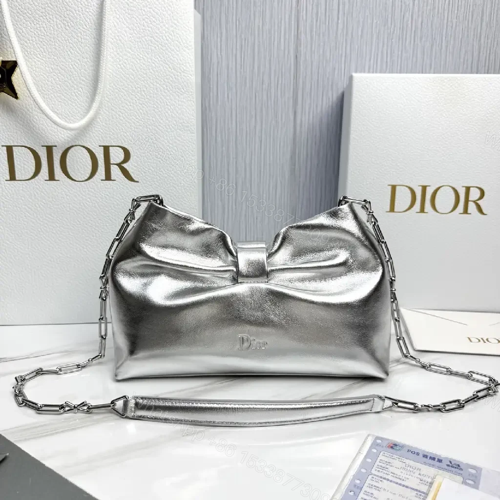 Shimmer Metallic Bow Crossbody: Luxe Compact Crossbody Bag — view 1