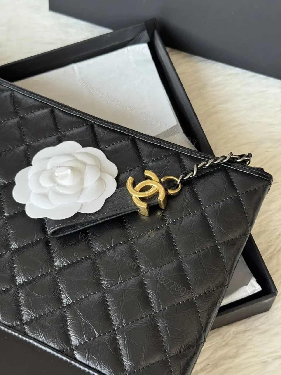 View 2 of Quilted Leather Wristlet: Modern Luxury, Compact Chic
