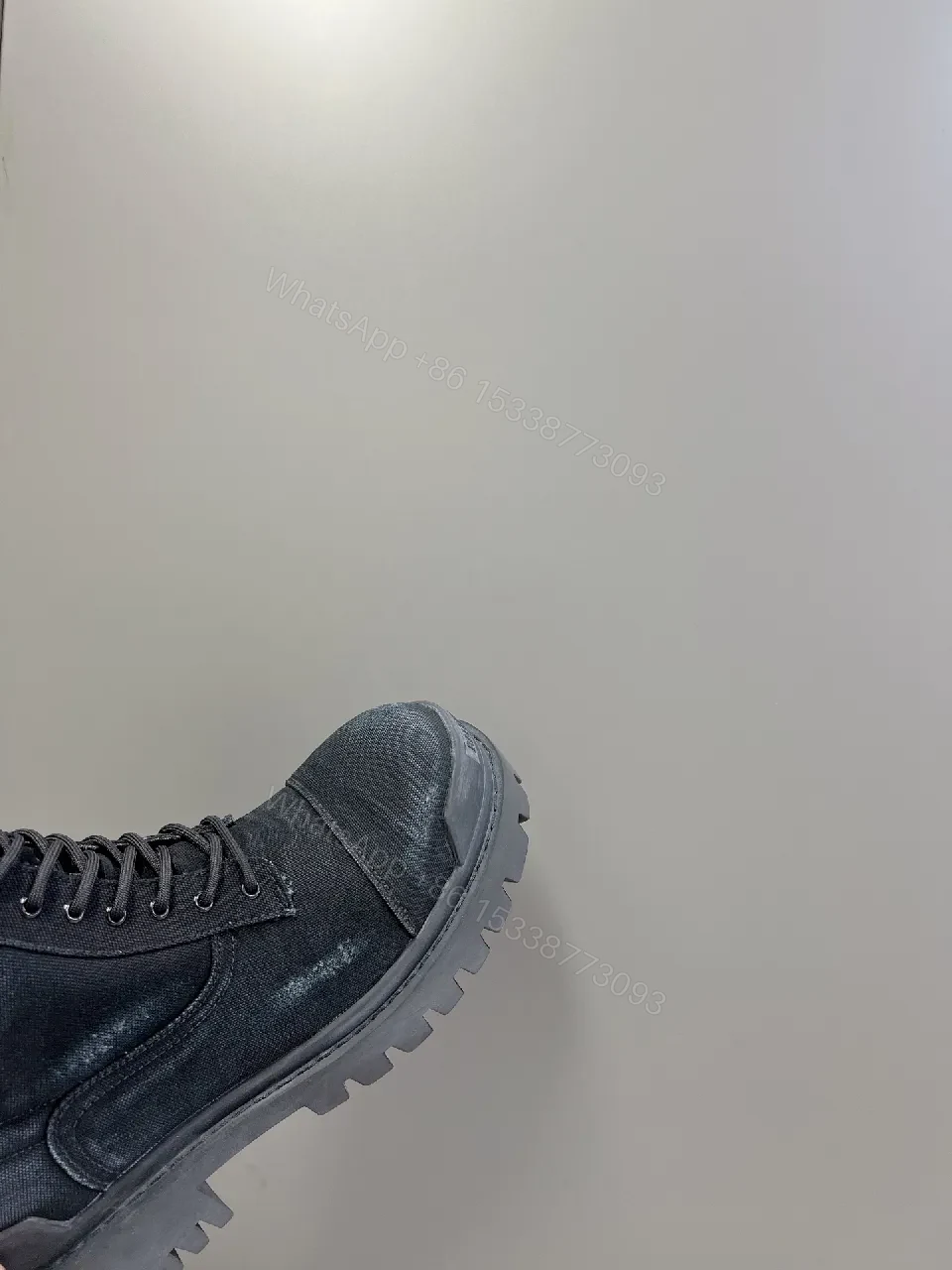 View 8 of Bold Black Combat Boots with Rugged Texture