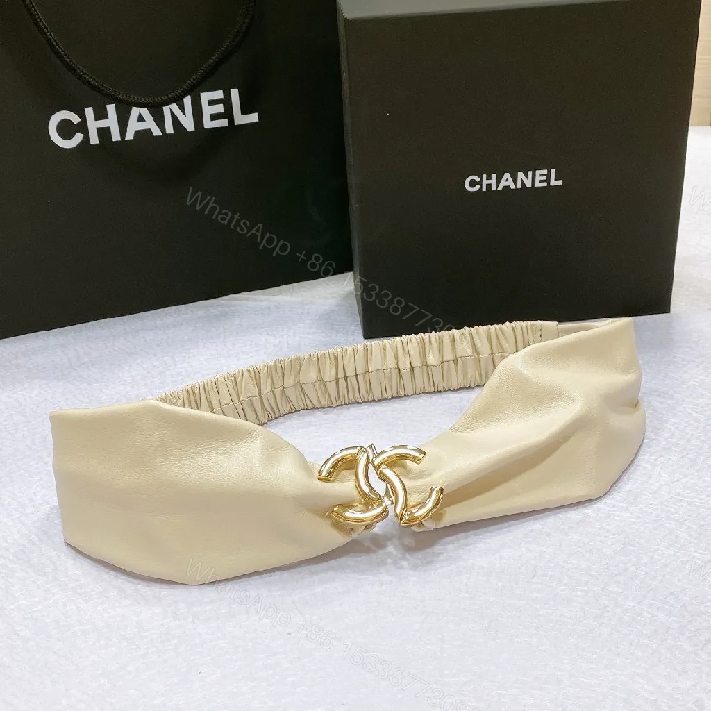 View 6 of Ivory Faux Leather Headband with Gold Logo Emblem - Chic, Everyday Glam