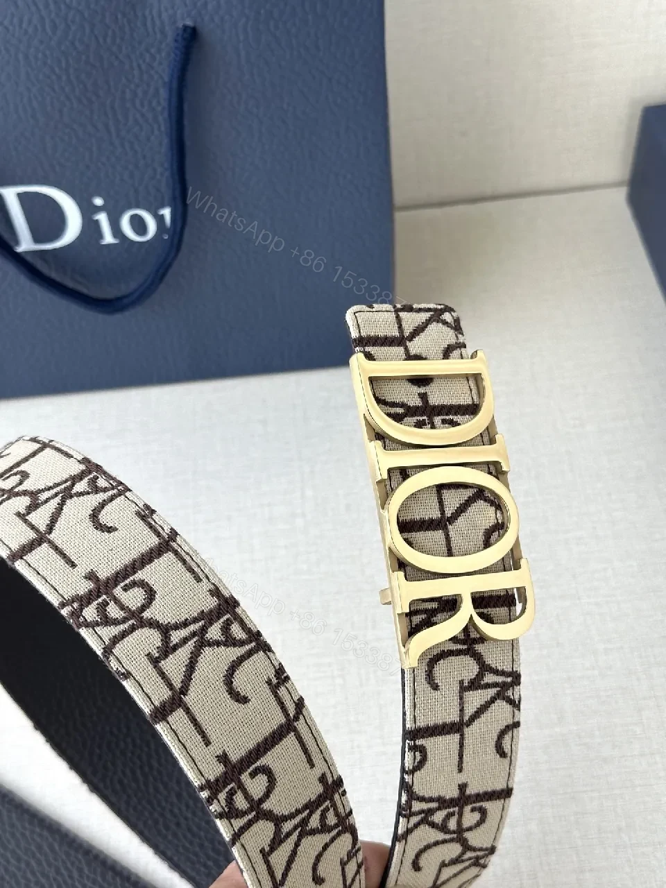 View 3 of Monogram Canvas Belt with Gold Logo Buckle, Black Interior