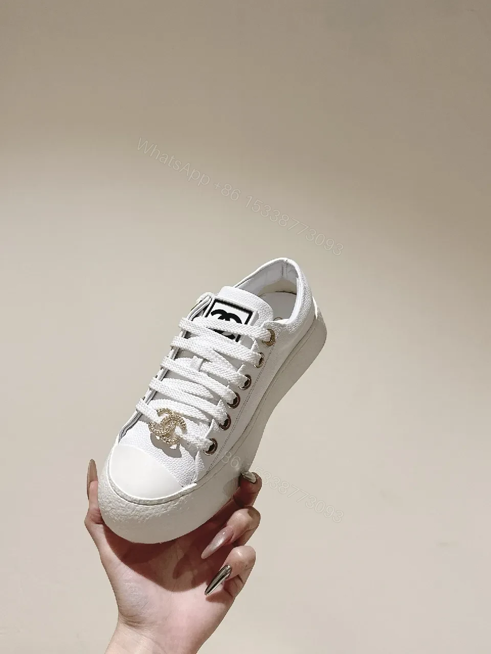 View 7 of White Leather High-Top Sneakers with Gold Accents