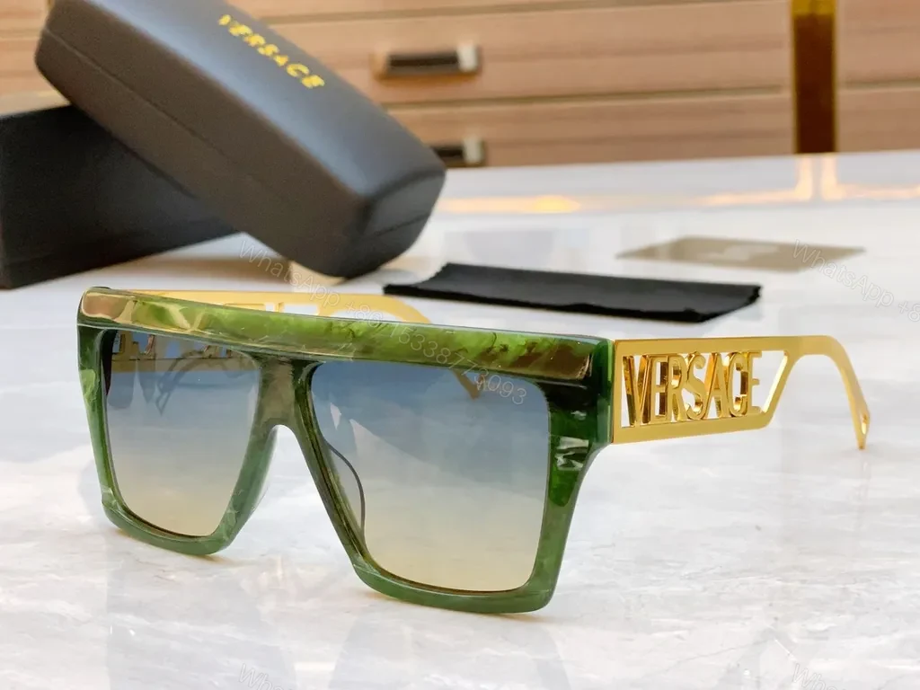 View 2 of Bold Black & Gold Luxe Sunglasses - Statement Frame, All-Day Comfort