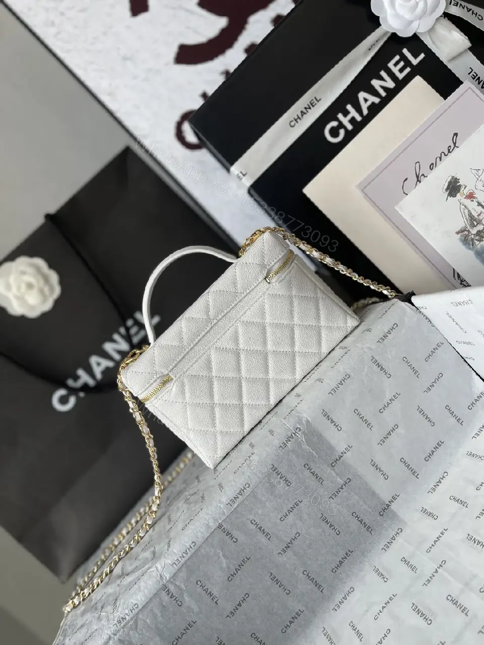 View 12 of Quilted Chic Mini Bag with Chain - Luxury Day-to-Night Accessory