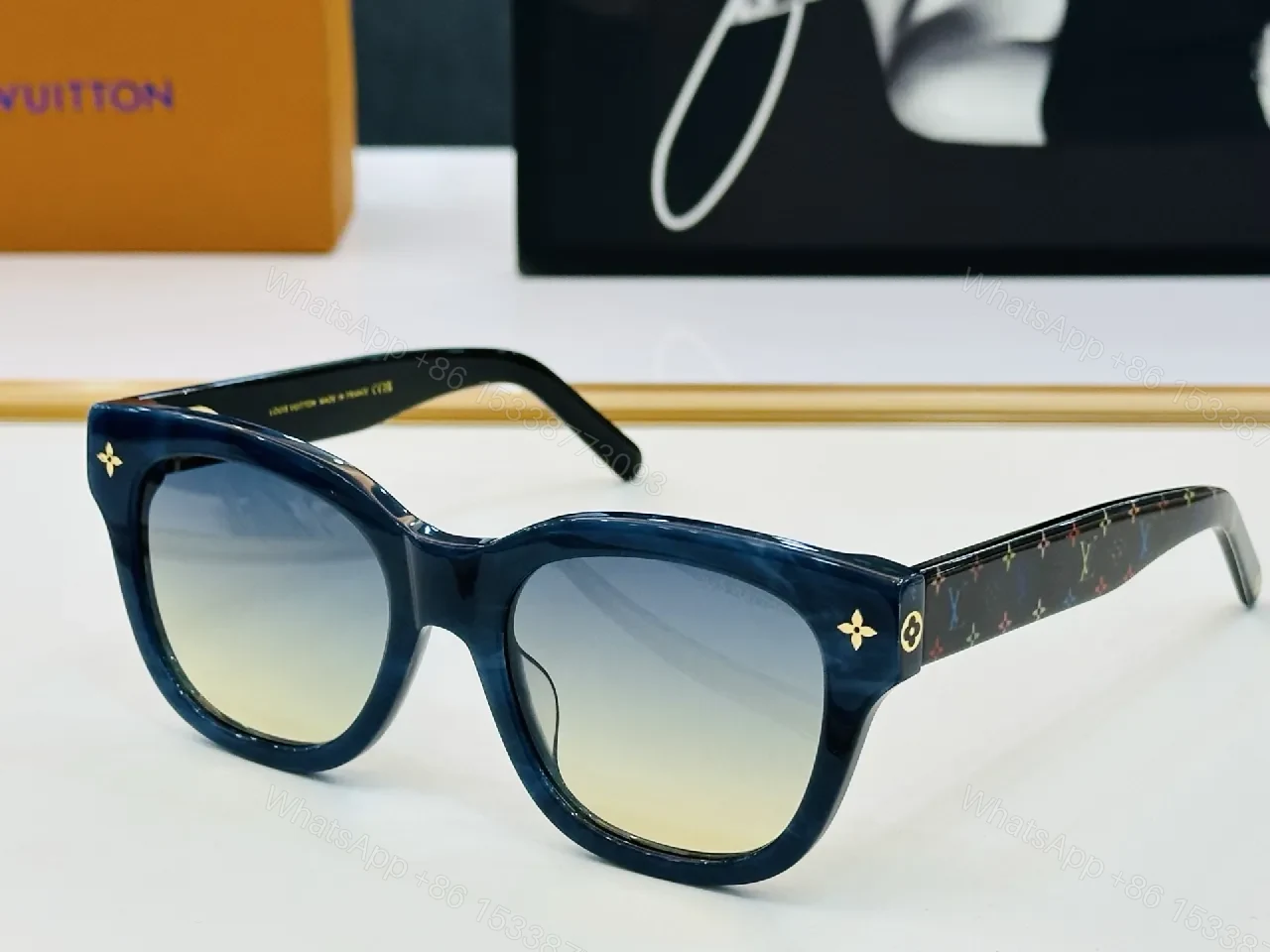 View 4 of Bold Black Frame Sunglasses with Luxe Monogram Detailing