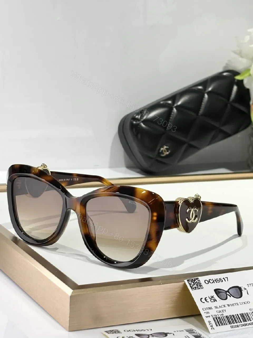 View 6 of Oversized Black Cat-Eye Sunglasses with Subtle Logo Details