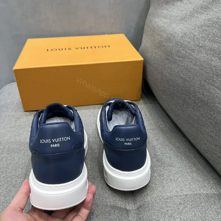 View 8 of Navy Leather LV-Patterned Low-Top Sneakers â€” Modern Luxury