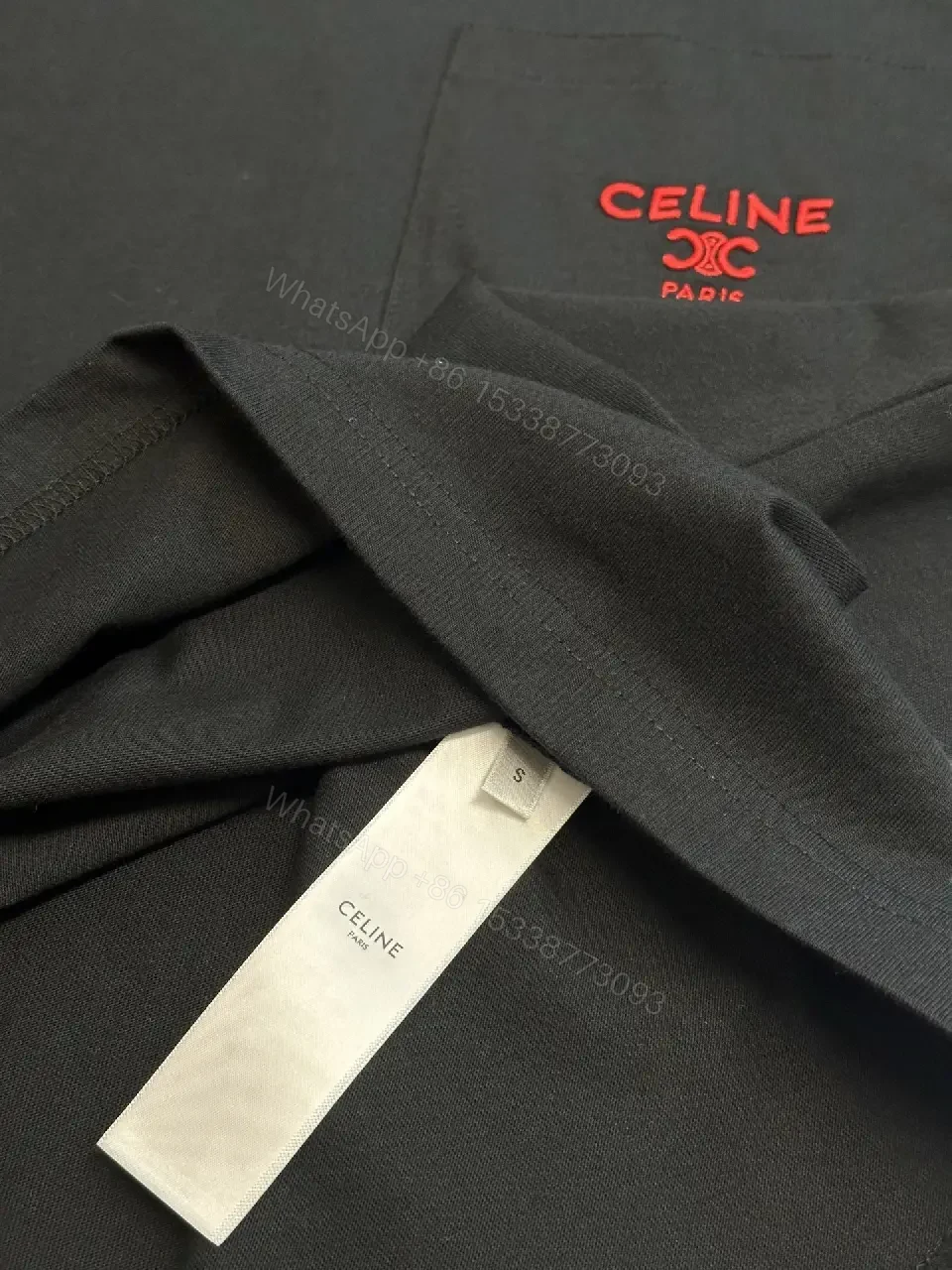 View 10 of Minimalist Black Tee with Red Pocket Detailing - Premium Unisex Tee