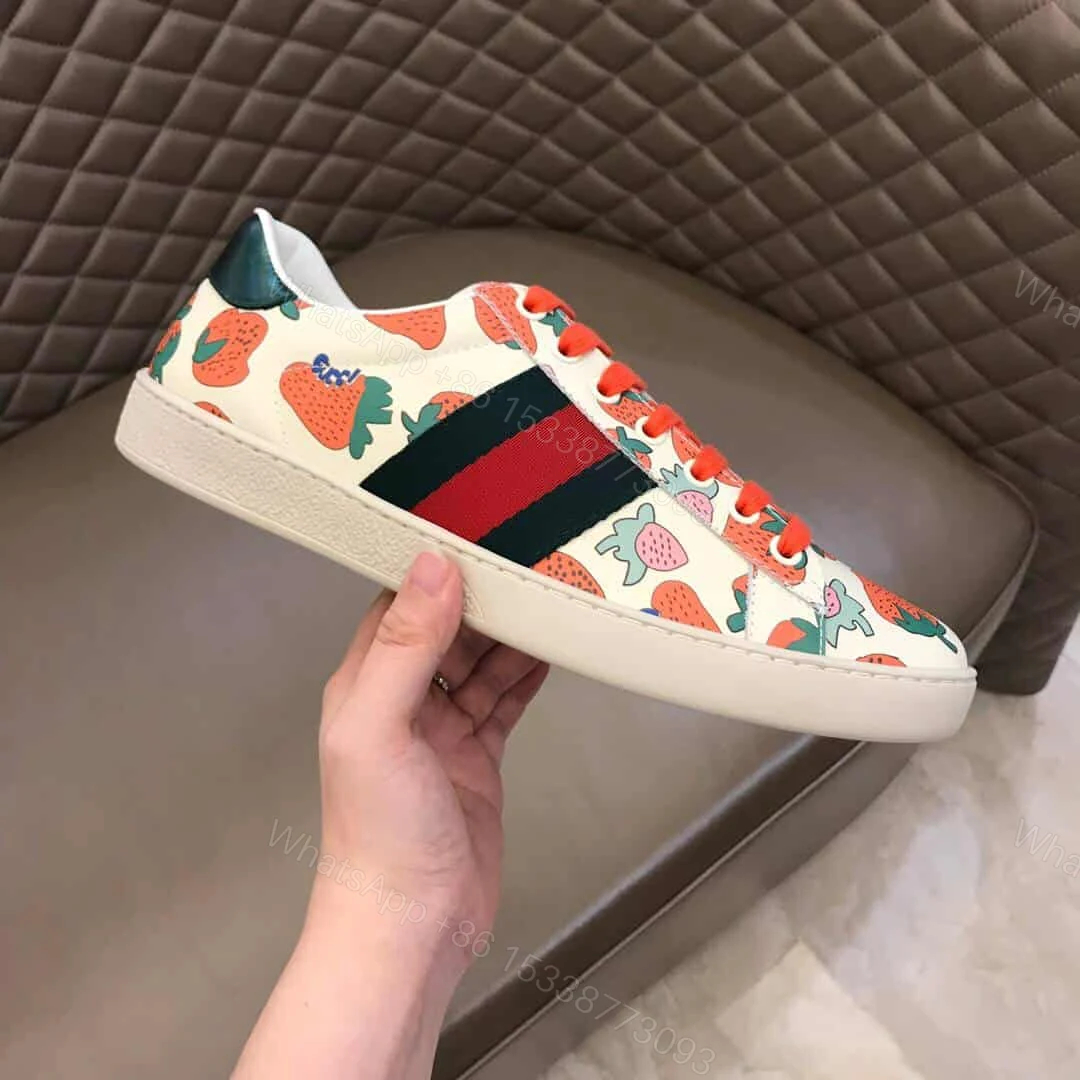 View 2 of GUCCI ACE LEATHER SNEAKER WITH GUCCI STRAWBERRY PRINT – GC10