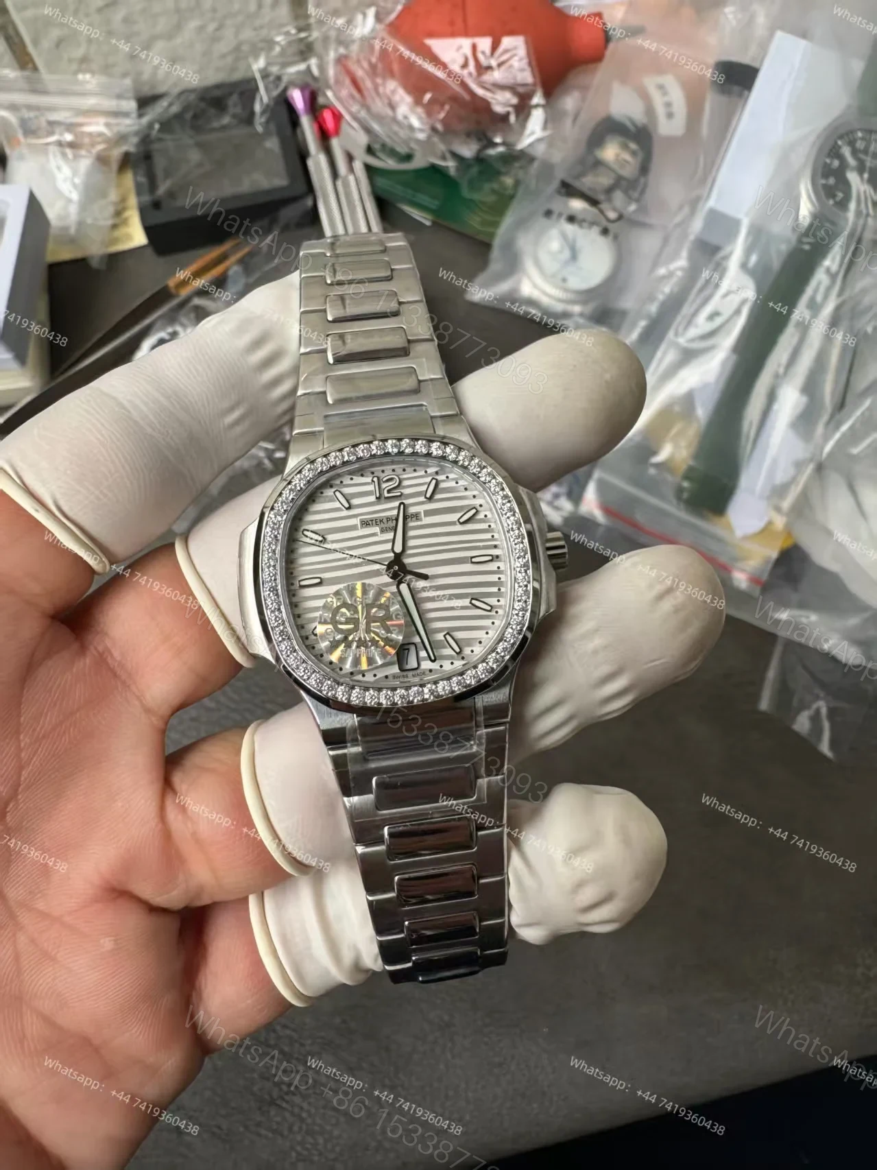 View 10 of Patek Philippe Super Clone Nautilus 7118/1200A-010 White Dial Diamond Bezel 35.2mm