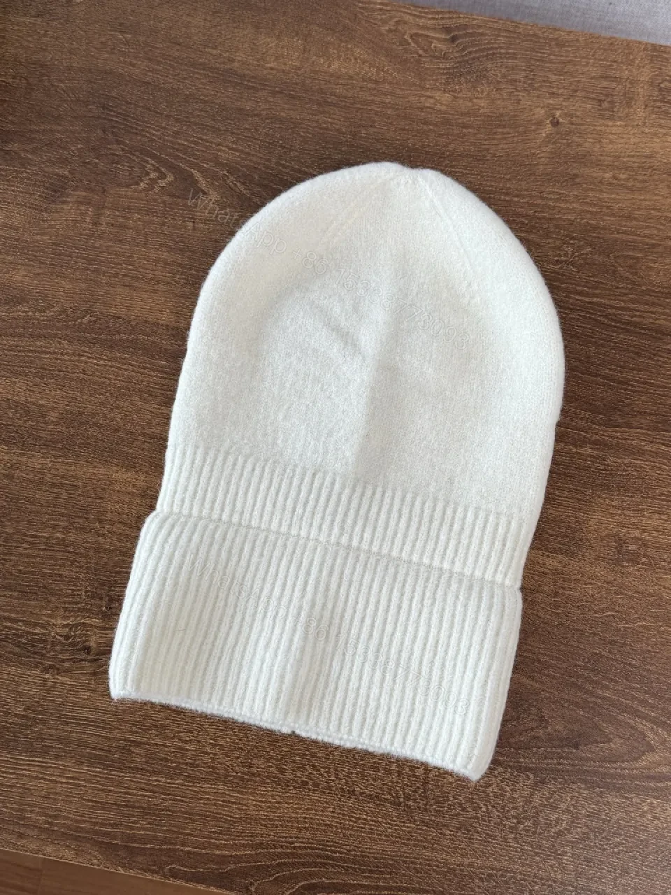View 3 of Chic Minimalism Beanie: Off-White Knit, Embroidered Logo, Everyday Luxury