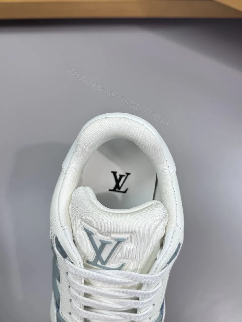 View 2 of White Leather Sneaker with Subtle LV-Inspired Accents