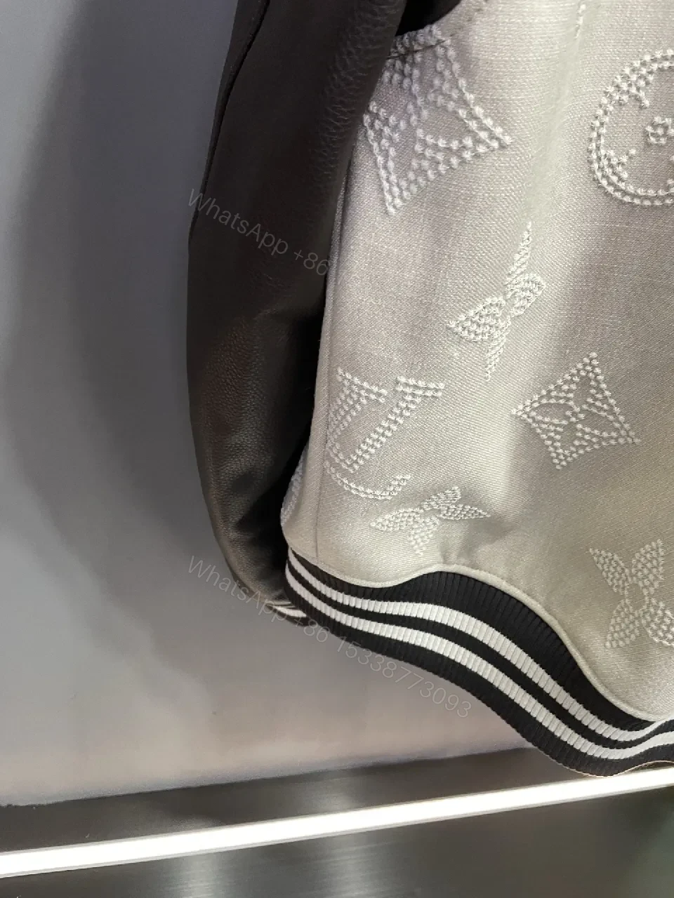 View 4 of Textured Monogram Varsity Jacket: Modern Luxury, All-Day Comfort