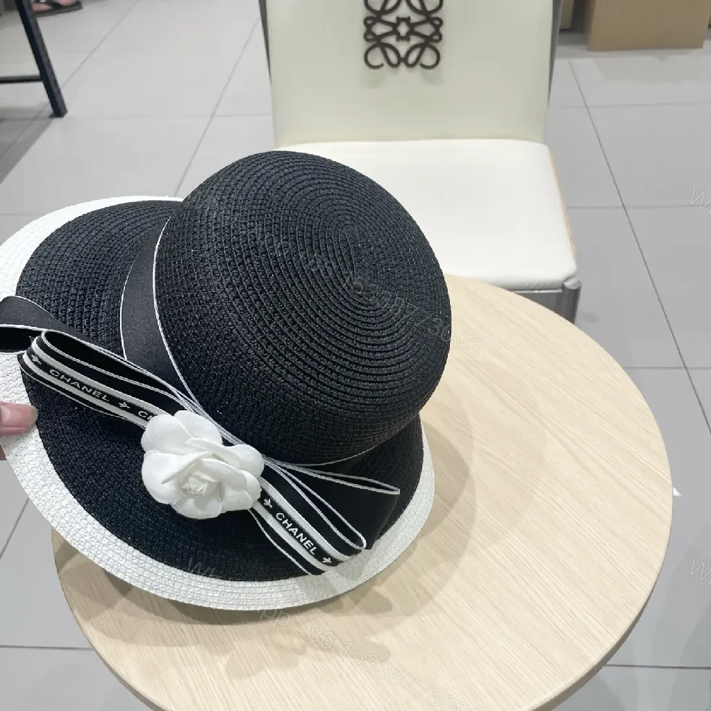 View 4 of Black-White Straw Hat with Ribbon Flower Accent - Sun Ready Couture-style Hat