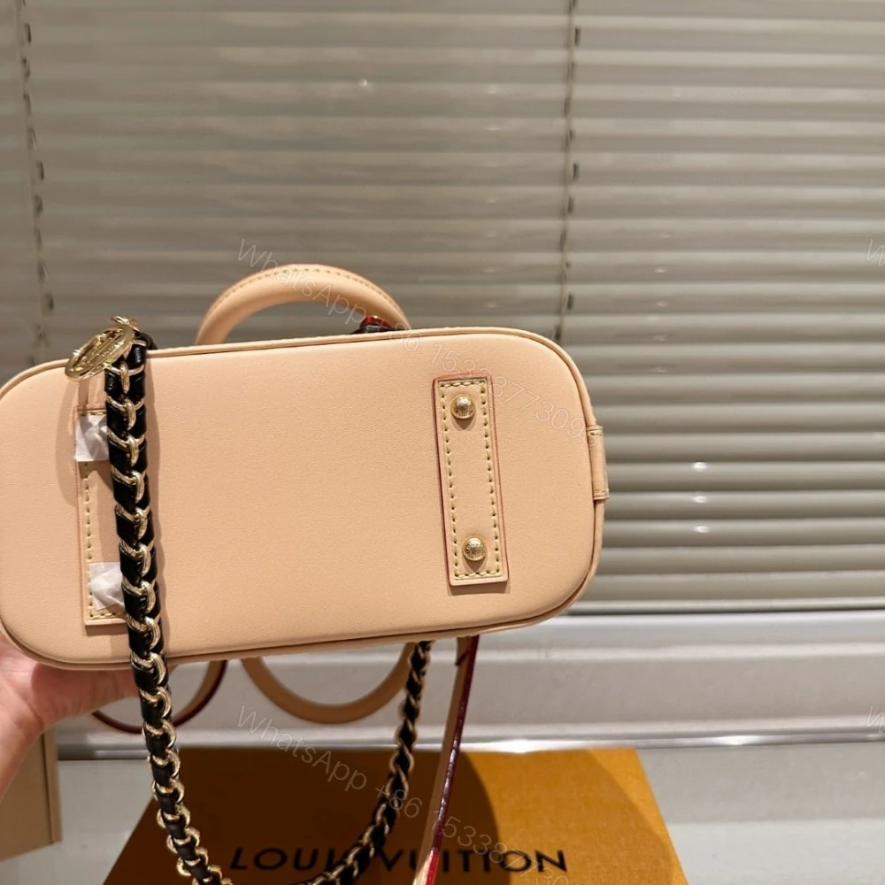 View 7 of Louis Vuitton Alma Mini LV And I Monogram Dune 25Cm K00015