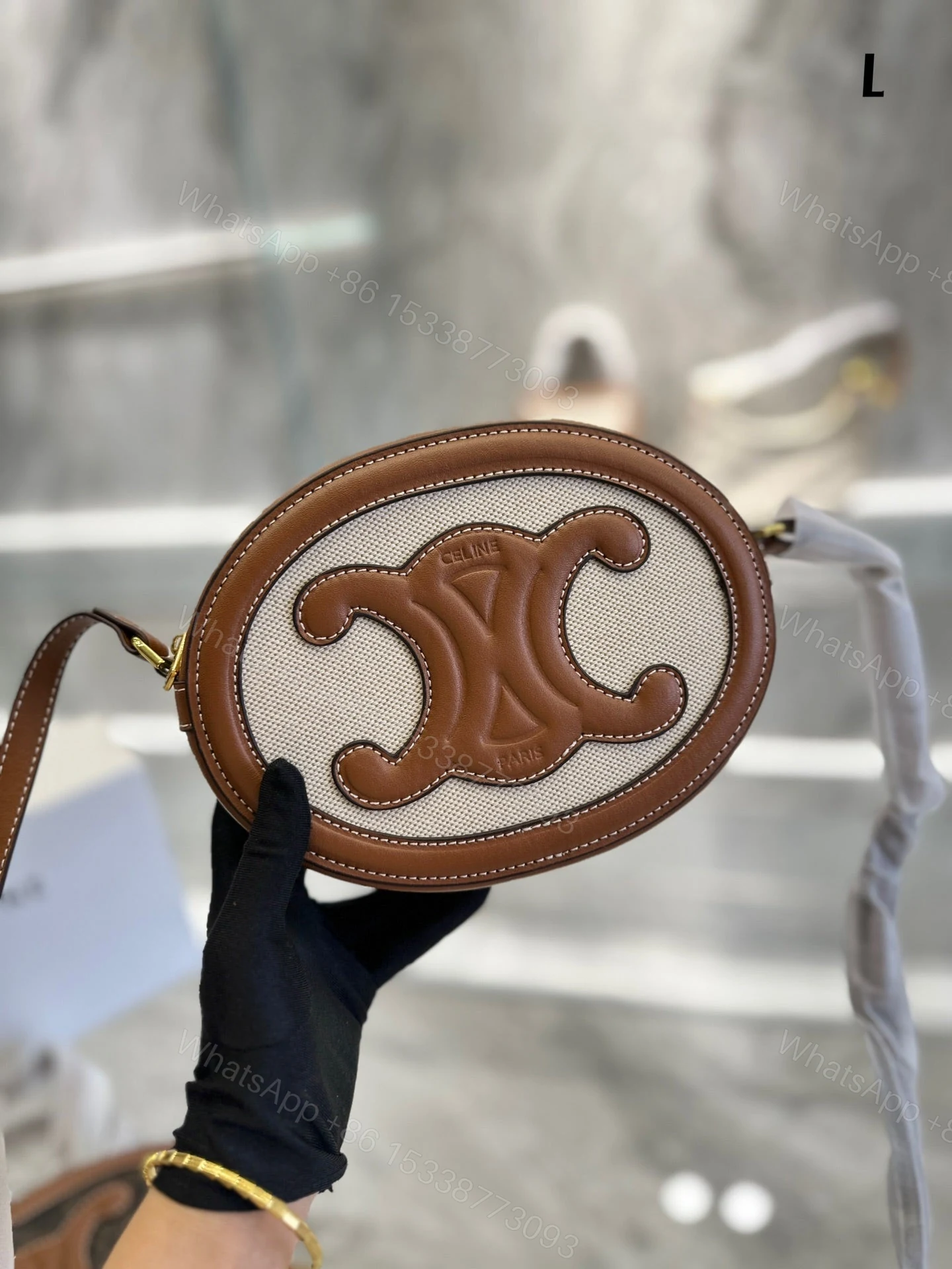 View 4 of CELINE OVAL BAG CUIR TRIOMPHE IN TEXTILE AND CALFSKIN NATURAL 20CM 198602EFL02NT