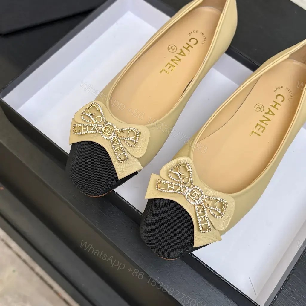 View 7 of Beige Leather Flats with Black-Toe Cap & Crystal Bow