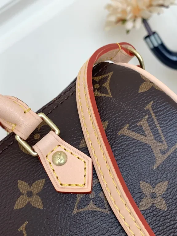 View 2 of Louis Monogram Carry: City-Ready Leather-Trim Handbag