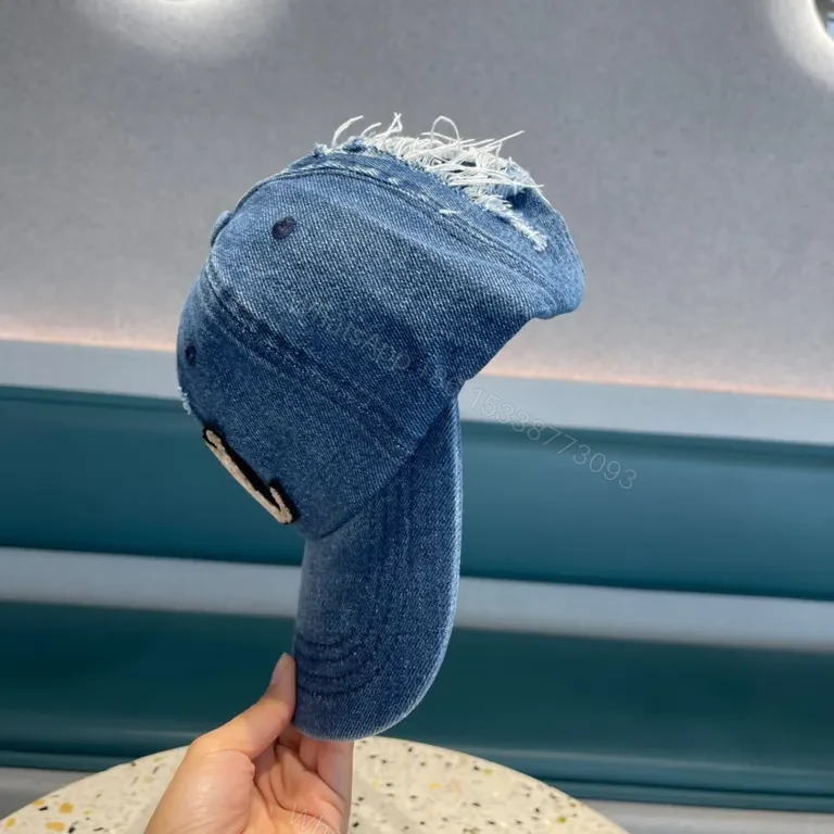 View 2 of Blue Denim Cap Lux Embroidered LV Logo â€“ Casual Luxury Hat