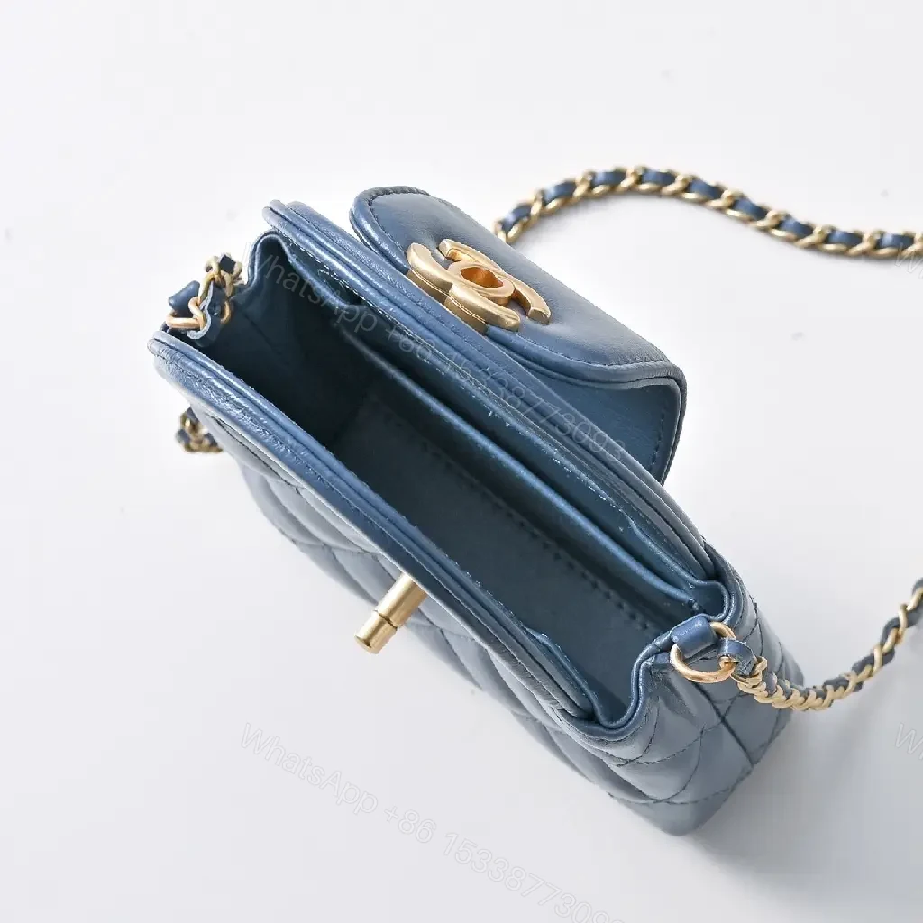 View 3 of Compact Blue Quilted Satchel with Gold Clasp Bag