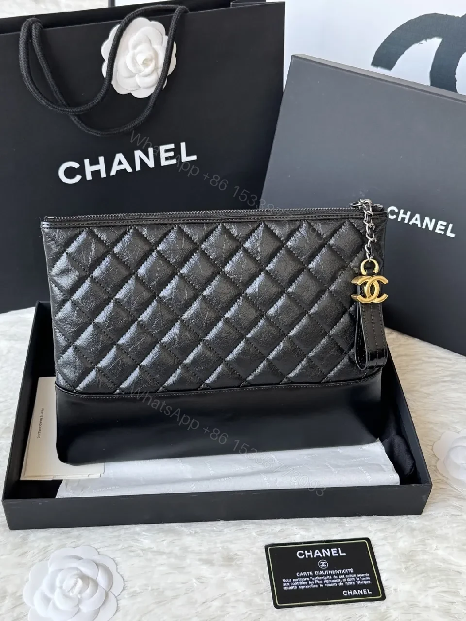 View 2 of Quilted Leather Clutch: Sophisticated, Multi-Use Night Bag