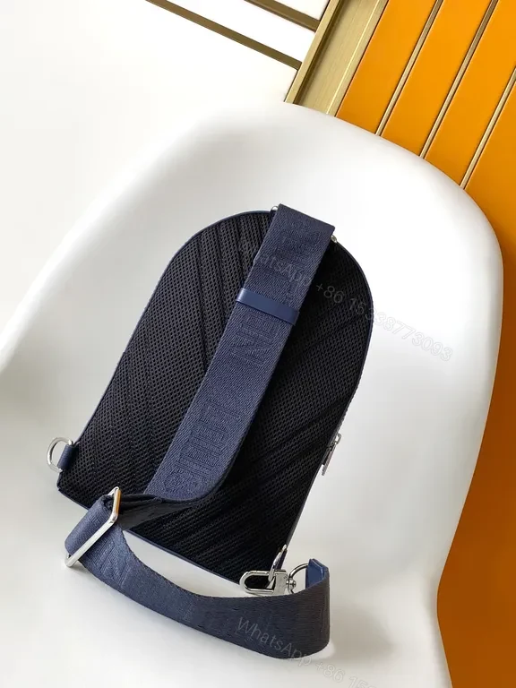 View 4 of Chic Blue Leather Compact Backpack with LV Detail