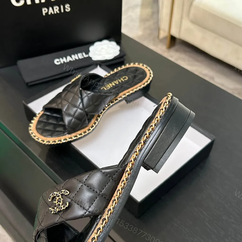 View 9 of Black Quilted Slip-Ons with Chain Trim: Elevated Comfort