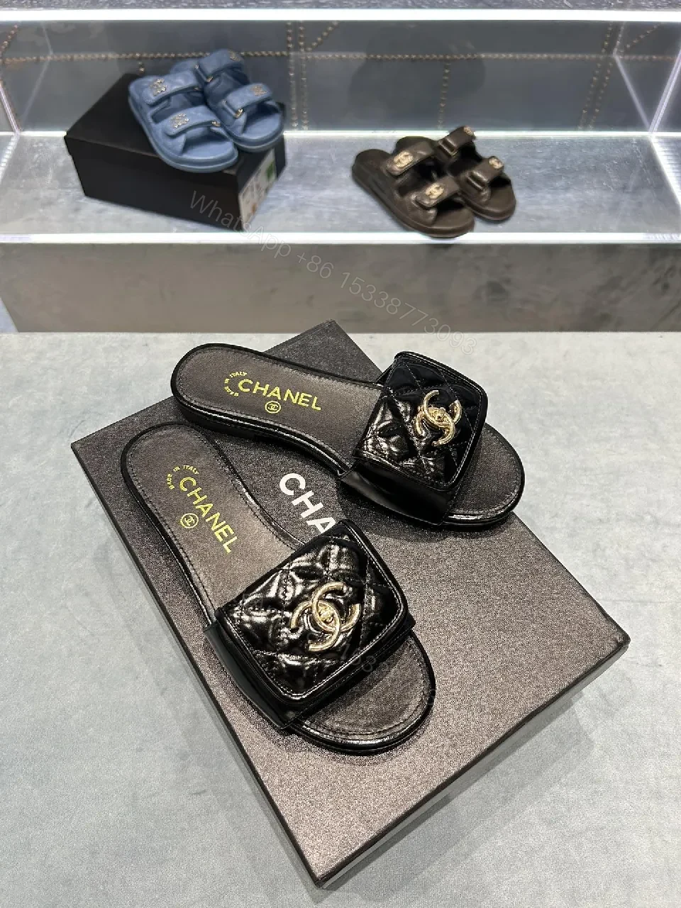 View 5 of Black Quilted Leather Slide with Gold Logo Escort