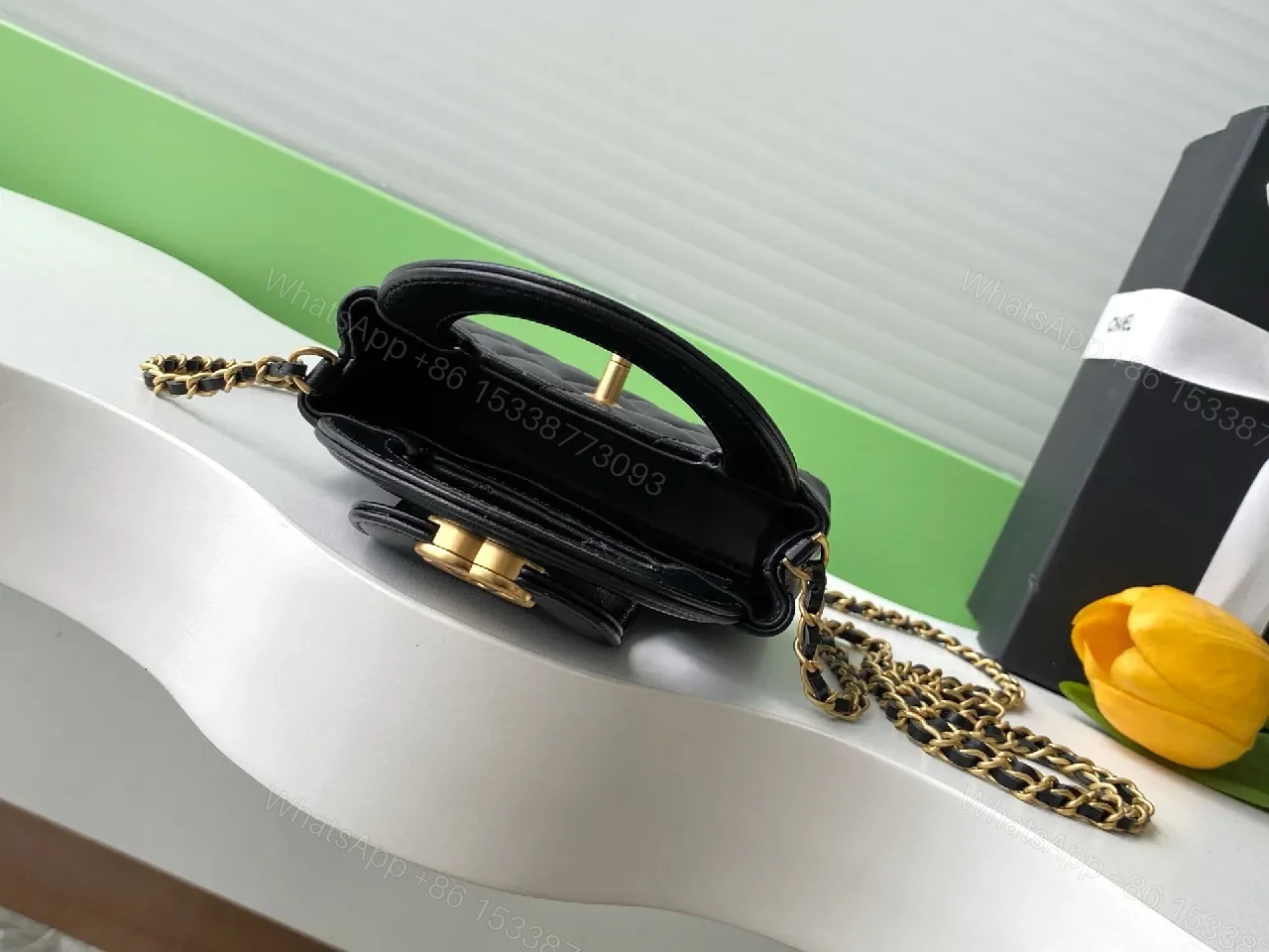 View 5 of Black Quilted Mini Handbag with Gold Hardware, Chain Strap