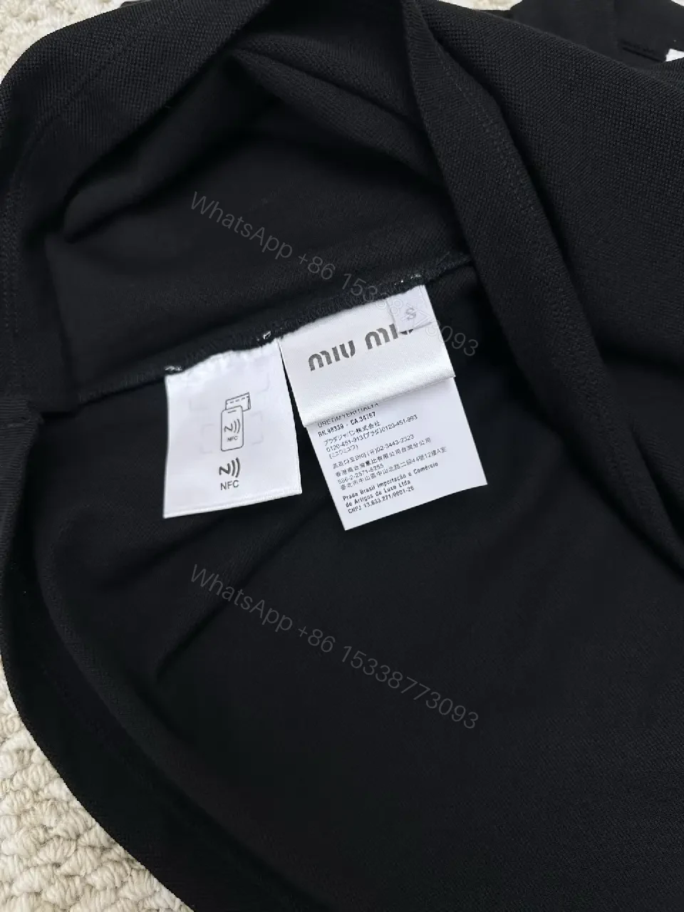 View 3 of black cotton polo shirt with logo for everyday luxury men