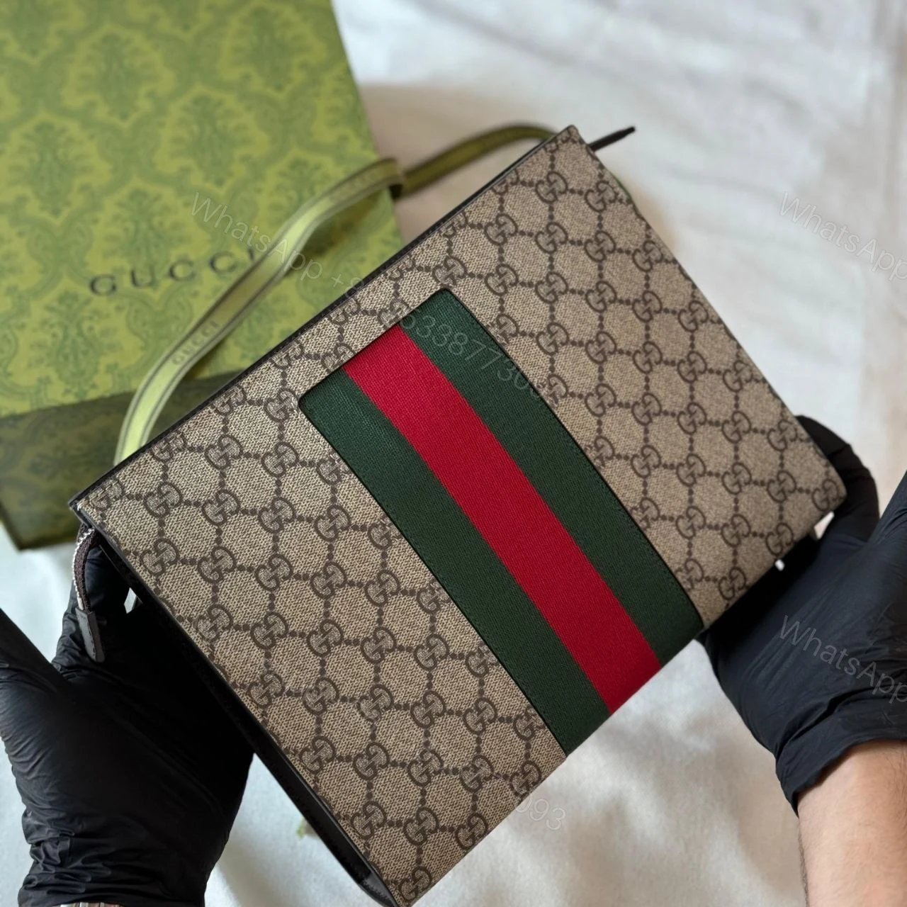 View 3 of GUCCI WEB WRISTLET SUPREME CLUTCH GG