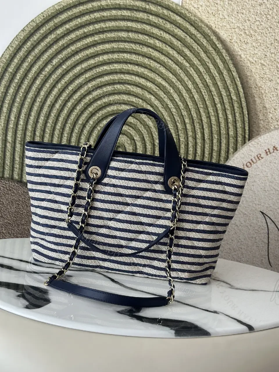 View 9 of Navy Stripe Woven Tote Bag with Leather Accents and Chanel Logo